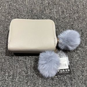 Small wallet with PomPoms